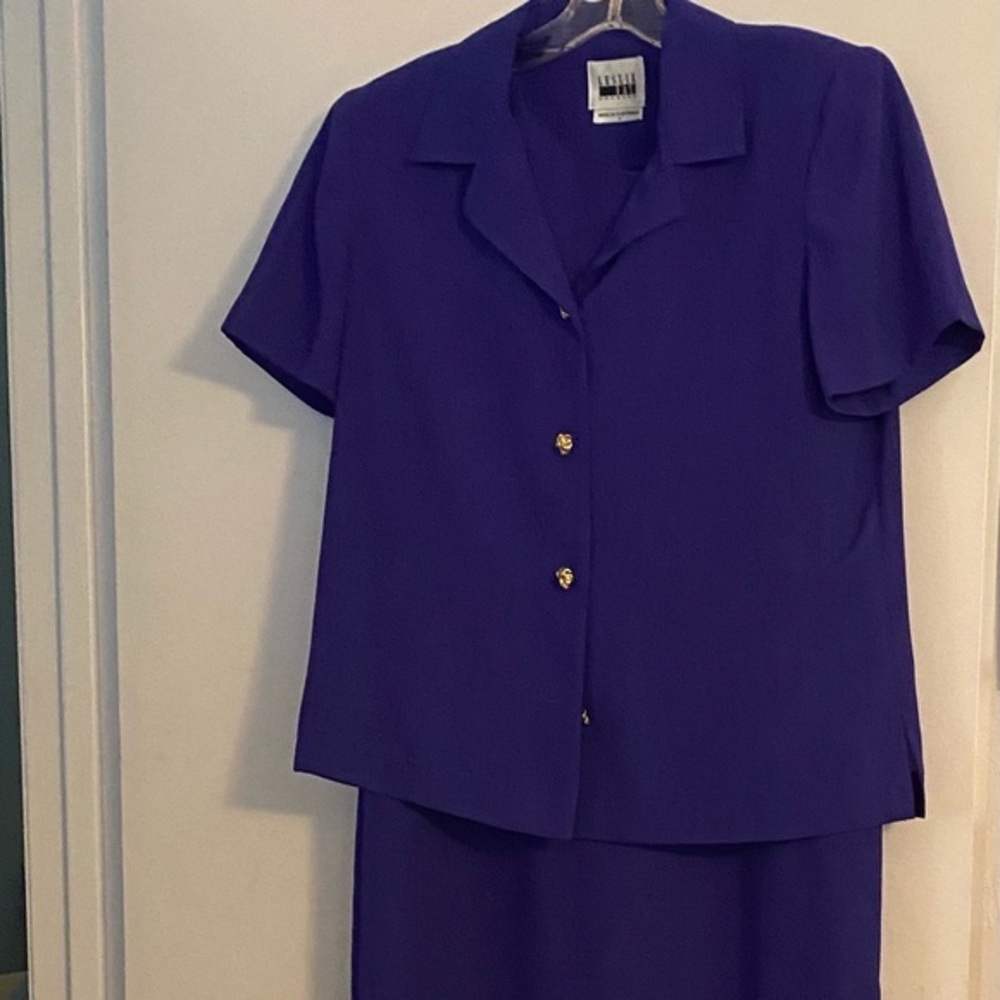 Sleeveless dress with short sleeve Jacket.